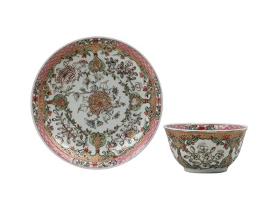 Lot 259 - A CHINESE FAMILLE ROSE CUP AND SAUCER.