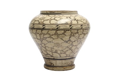 Lot 883 - A CHINESE CIZHOU 'LOTUS SCROLL' JAR.