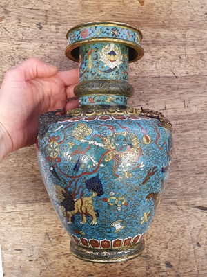 Lot 35 - A CHINESE GILT BRONZE AND CLOISONNÉ ENAMEL 'LION DOGS' BUDDHIST LONGEVITY VASE, BUMPA.