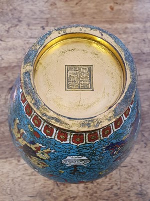 Lot 35 - A CHINESE GILT BRONZE AND CLOISONNÉ ENAMEL 'LION DOGS' BUDDHIST LONGEVITY VASE, BUMPA.