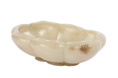 Lot 34 - A CHINESE PALE CELADON JADE 'MAGNOLIA' BRUSH WASHER.