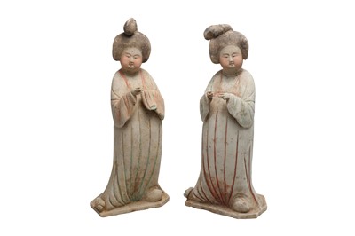 Lot 235 - A PAIR OF CHINESE POTTERY FIGURES OF CORT LADIES.