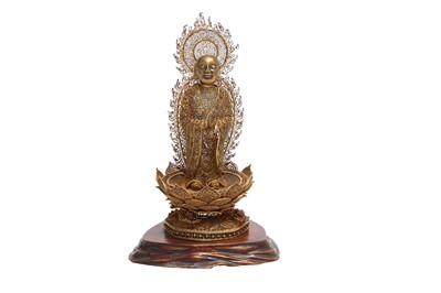 Lot 197 - A CHINESE CANTON GILT-FILIGREE FIGURE OF A BUDDHA.