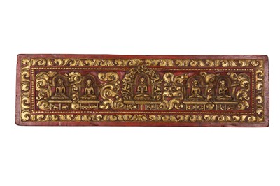 Lot 484 - A TIBETAN LACQUER AND GILT-WOOD MANUSCRIPT COVER.