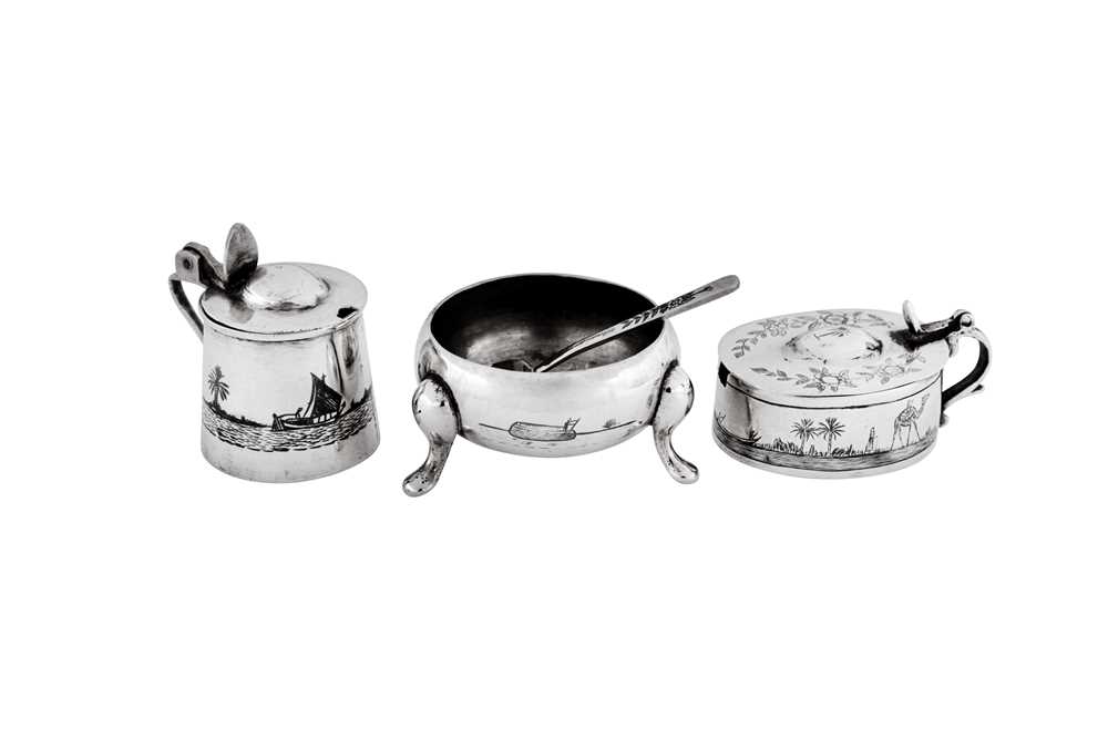Lot 294 - A mixed group of early to mid-20th century Iraqi silver and niello cruets, Basra or Omara circa 1930-50