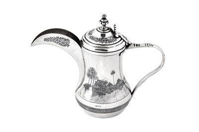 Lot 306 - An early 20th century Iraqi silver and niello Dallah coffee pot, circa 1930, signed Omara, Amer, Raheem
