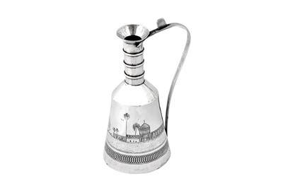 Lot 305 - An early to mid-20th Iraqi silver and niello water ewer, circa 1940 signed Omara, Salih