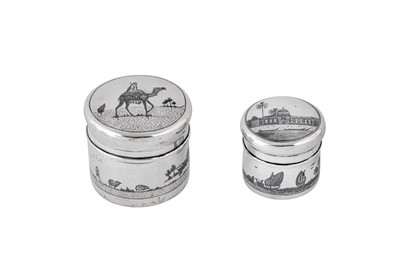 Lot 289 - Two early 20th century Iraqi silver and niello dressing table jars, Basra or Omara circa 1930