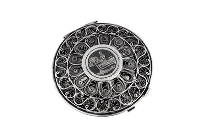 Lot 267 - A mid-20th century Iraqi silver, filigree and niello compact, Basra circa 1940