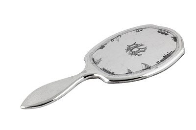 Lot 287 - An early 20th century Iraqi silver and niello hand mirror, Basra circa 1920 signed Zahroon