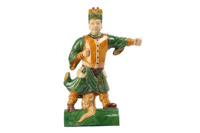 Lot 269 - A CHINESE SANCAI GLAZED 'ARCHER' ROOF TILE.