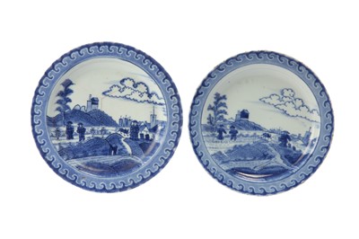 Lot 80 - A CHINESE BLUE AND WHITE 'DESHIMA ISLAND' DISH, TOGETHER WITH A JAPANESE VERSION OF THE SAME DISH.