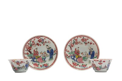 Lot 74 - A PAIR OF CHINESE FAMILLE ROSE 'LOVERS' CUPS AND SAUCERS.