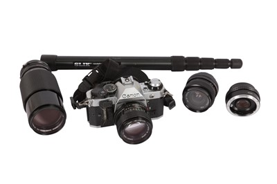 Lot 111 - A Canon AE-1 SLR Camera Outfit