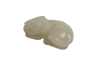 Lot 629 - A CHINESE WHITE JADE CARVING OF AN OX.