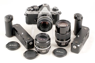 Lot 36 - A 3-Lens Nikon FM2n Film Camera Outfit.