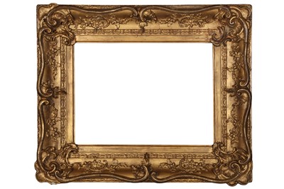 Lot 187 - A LOUIS XV STYLE SWEPT AND GILDED COMPOSITION FRAME