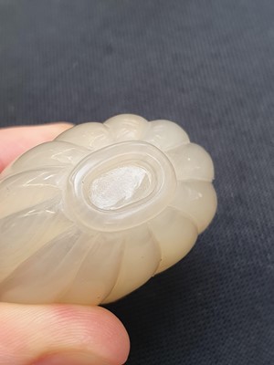 Lot 109 - TWO CHINESE AGATE SNUFF BOTTLES.