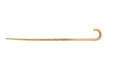 Lot 583 - λ A RHINOCEROS HORN WALKING STICK.