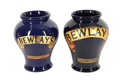 Lot 389 - A PAIR OF LATE 19TH / EARLY 20TH CENTURY BLUE GLAZED DOULTON TOBACCO JARS