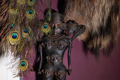 Lot 44 - A SOUTH EAST ASIAN TERRACOTTA AND BRONZE FIGURE  OF A DEITY