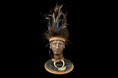 Lot 43 - A MODEL OF A TRIBAL ELDERS' HEAD A NEW GUINEA  TRIBAL HEAD UNDER A LARGE 19TH CENTURY GLASS DOME