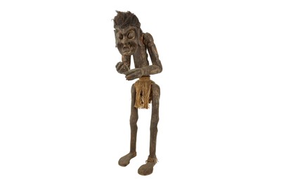 Lot 40 - A CARVED WOODEN TRIBAL FIGURE