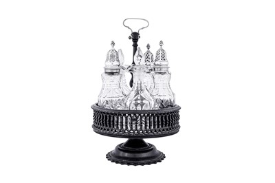 Lot 532 - A George II/III silver mounted mahogany five bottle cruet, London circa 1760 by Thomas Congreave (Grimwade 3815)