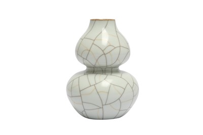 Lot 940 - A CHINESE CRACKLE-GLAZED DOUBLE GOURD VASE