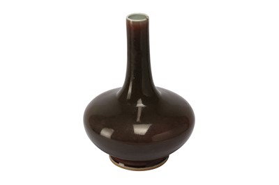 Lot 475 - A CHINESE OX BLOOD-GLAZED BOTTLE VASE.