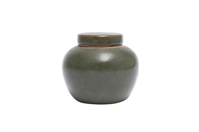Lot 203 - A CHINESE TEADUST-GLAZED JAR AND COVER.