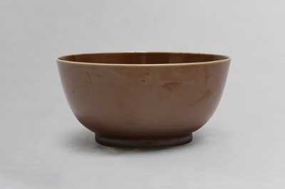 Lot 74 - A CHINESE BROWN-GLAZED BOWL.