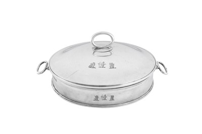 Lot 503 - An unusual George IV sterling silver breakfast dish / plate warmer, London 1824 by Richard Sibley (this mark reg. 13th July 1812)