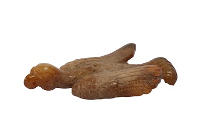 Lot 656 - A CHINESE YELLOW JADE 'PHOENIX' CARVING.