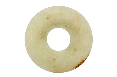 Lot 23 - A CHINESE YELLOW JADE ARCHAISTIC DISC, BI.