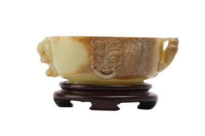 Lot 261 - A CHINESE YELLOW JADE WASHER.