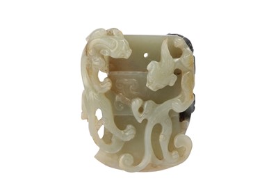 Lot 578 - A CHINESE PALE CELADON JADE ARCHAISTIC 'AXE' PENDANT.