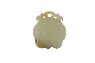 Lot 867 - A CHINESE PALE CELADON JADE 'PHOENIX' PENDANT.