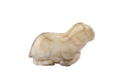 Lot 655 - A CHINESE CHICKEN BONE JADE 'RAM' PENDANT.