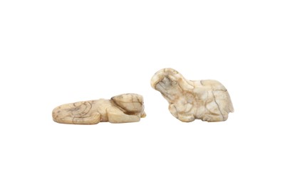 Lot 180 - A CHINESE CHICKEN BONE JADE 'RAM' PENDANT TOGETHER WITH A ‘QILIN’ CARVING.