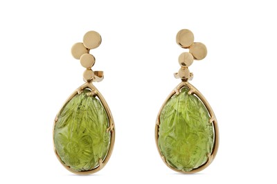 Lot 59 - A pair of carved peridot earclips