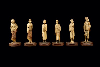 Lot 362 - A SET OF SIX 19TH CENTURY CARVED AND PAINTED BONE FIGURES WITH WOODEN COVERS