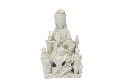 Lot 635 - A CHINESE BLANC-DE-CHINE MODEL OF GUANYIN.