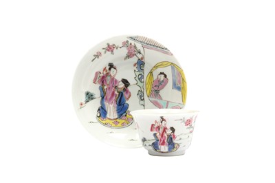 Lot 72 - A CHINESE FAMILLE ROSE 'LOVERS' TEA CUP AND SAUCER.