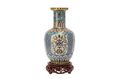Lot 823 - A CHINESE CLOISONNE ENAMEL BOTTLE VASE.