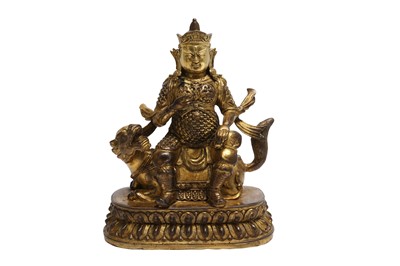 Lot 494 - A CHINESE GILT LACQUER-BRONZE FIGURE OF VAISRAVANA.