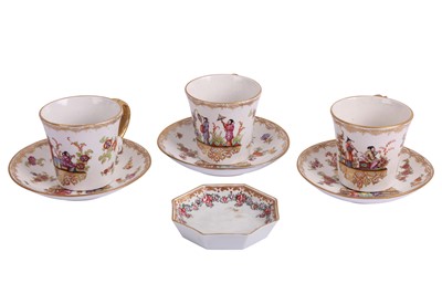 Lot 117 - THREE CONTINENTAL PORCELAIN GILT AND PAINTED TEA CUPS, IN THE MEISSEN TASTE, LATE 19TH CENTURY