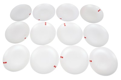 Lot 1221 - LUESMA & VEGA, SPAIN, A SET OF TWELVE WHITE GLASS DISHES, 21ST CENTURY