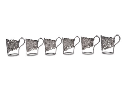 Lot 242 - A set of six early 20th century Iranian (Persian) unmarked silver tea glass holders, Shiraz circa 1930