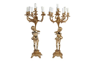 Lot 81 - A PAIR OF GILT METAL SEVEN LIGHT CANDELABRA IN LOUIS XV STYLE